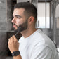 Lifestyle image of a man using a DermTech Derma Roller on his face to stimulate beard growth and enhance hair follicles. Discover how DermTechRoller helps men achieve thicker, fuller beards with at-home microneedling.